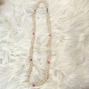 Pretty costume pearl necklace with scattered pink beads

17 inches